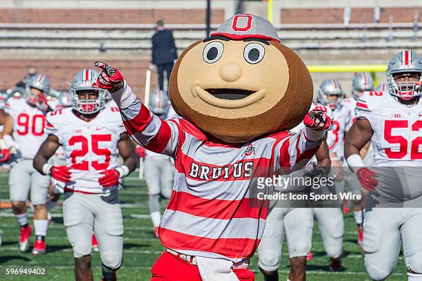 Ohio State Mascot Brutus Buckeye leades the Ohio State Buckeyes onto the field in action during a Big Ten football game between the Illinois Fighting...