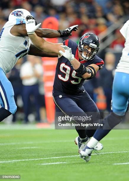 Texans DE J. J. Watt gets by Jeremiah Poutasi during the Houston Texans 20-6 win over the Tennessee Titans at NRG Stadium in Houston, TX.