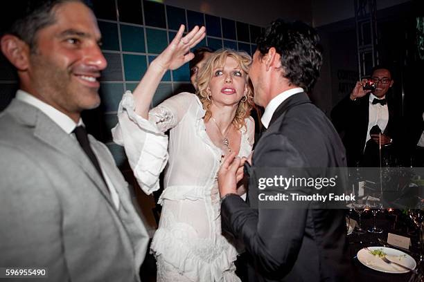 Courtney Love with guests during the 2nd Annual amfAR Inspiration Gala at The Museum of Modern Art in New York.