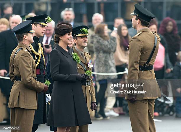 Prince William, Duke of Cambridge and Catherine, Duchess of Cambridge, wearing a bespoke Catherine Walker coat, attending the Irish Guards' St....