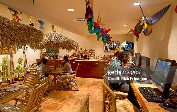 Maurice Miller of Brooklyn at the Tiki Room Internet Cafe on Rewards street at the Judge Rotenberg Center. The Judge Rotenberg Educational Center is...