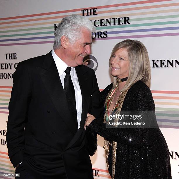 Singer, actress and director Barbra Streisand and her husband actor James Brolin arrive at the Kennedy Center for the Kennedy Center Honors.