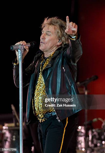 Rod Stewart performs live in Hyde Park in London.