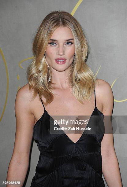 Rosie Huntington-Whiteley arriving at the premiere of the Burberry Festive Film in London