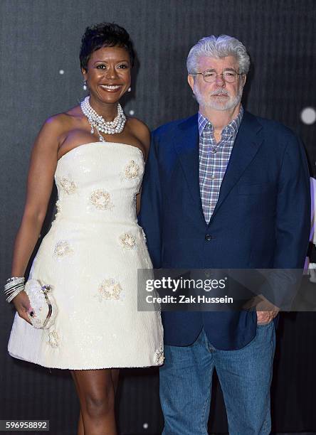 George Lucas and Mellody Hobson arriving at the European premiere of "Star Wars - The Force Awakens" in Leicester Square, London