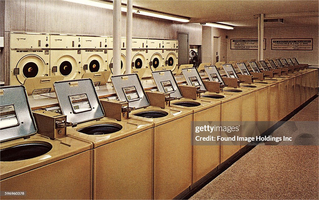 Vintage photograph of the interior of a large laundromat in the 1960s ...