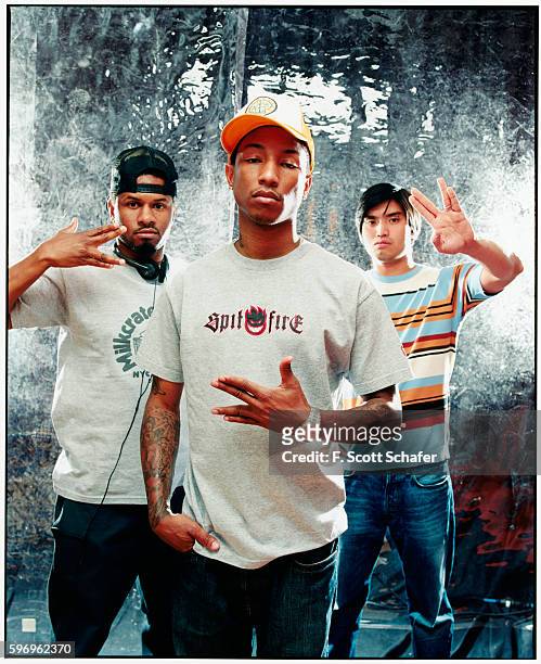Sheldon Shay Haley, Pharrell Williams and Chad Hugo) are photographed for Request Magazine in 2002.