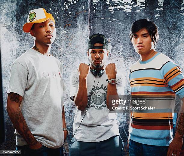 Pharrell Williams, Sheldon Shay Haley and Chad Hugo) are photographed for Request Magazine in 2002.