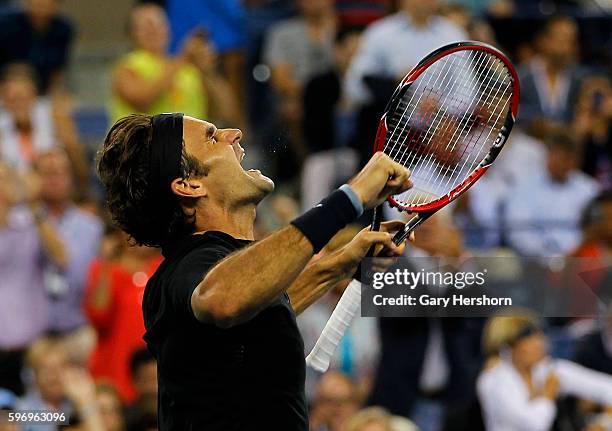 Roger Federer of Switzerland celebrates defeating Gael Monfils of France during their match at the US Open in New York, September 4, 2014.