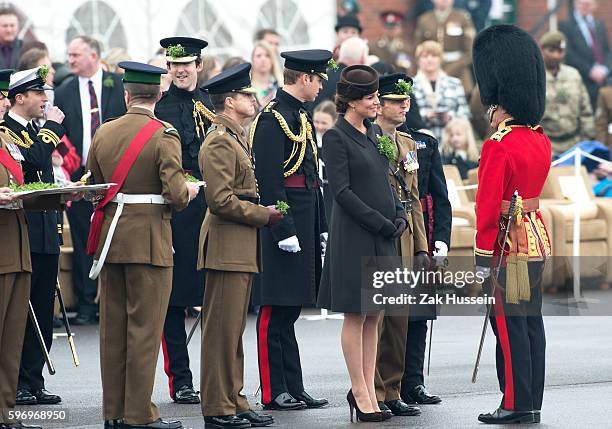 Prince William, Duke of Cambridge and Catherine, Duchess of Cambridge, wearing a bespoke Catherine Walker coat, attending the Irish Guards' St....