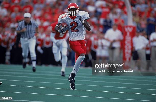 Bernard Berrian of the Fresno State Bull Dogs running with the ball during the game against the Wisconsin Badgers at Camp Randall Stadium in Madison,...