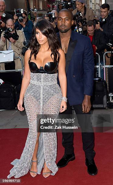 Kim Kardashian and Kanye West arriving at the GQ Men of the Year Awards at the Royal Opera House in London