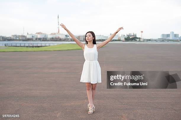 stand up woman - white dress stock pictures, royalty-free photos & images