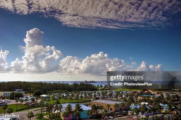 dramatic sky over freeport, bahamas - freeport bahamas stock pictures, royalty-free photos & images