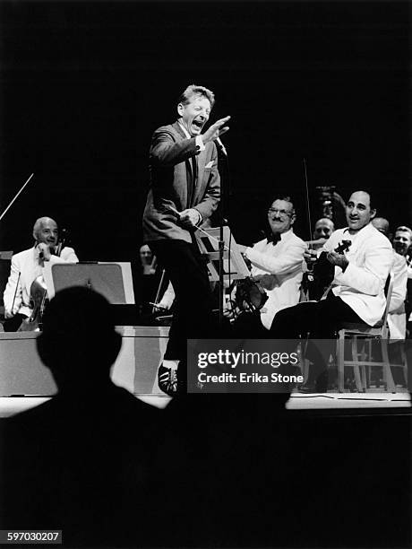 American actor, singer and comedian Danny Kaye conducts a concert by the Boston Symphony Orchestra at Tanglewood in Massachusetts, 1961.