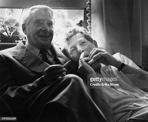 American actor, singer and comedian Danny Kaye with conductor Charles Munch , circa 1960.