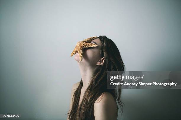 camouflage - starfish stock pictures, royalty-free photos & images
