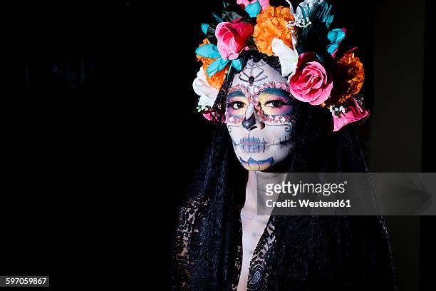 woman dressed as la calavera catrina, traditional mexican female skeleton figure symbolizing death - catrina mexico fotografías e imágenes de stock