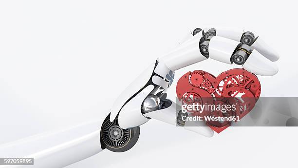 robot hand holding cogwheel heart - robotic heart stock-grafiken, -clipart, -cartoons und -symbole