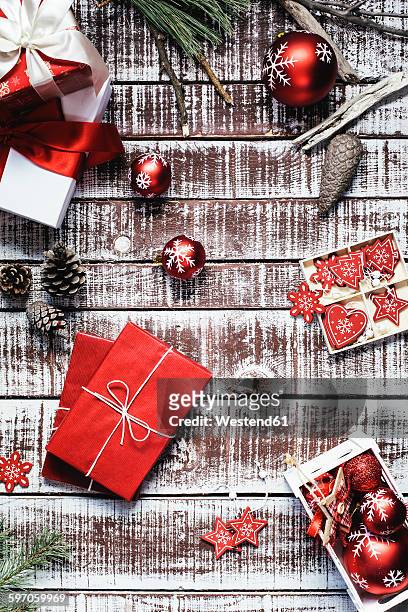 red christmas presents and christmas decoration - gift bag stock pictures, royalty-free photos & images