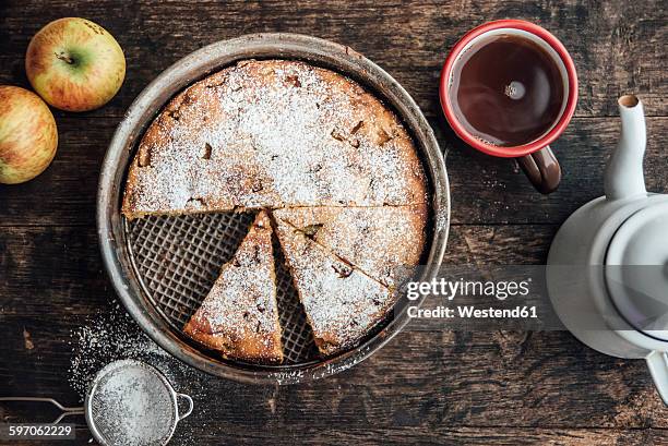 home-baked apple pie and cup of black tea - poedersuiker stockfoto's en -beelden