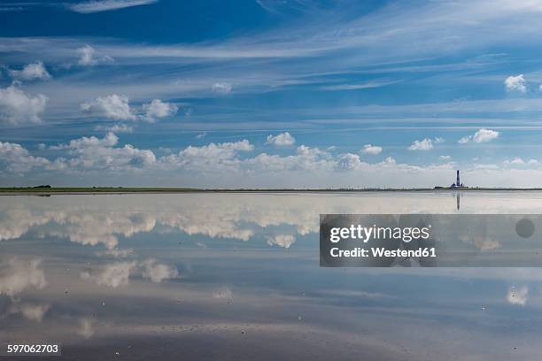 germany, schleswig-holstein, north sea coast, view of westerheversand lighthouse - wattenmeer stock-fotos und bilder