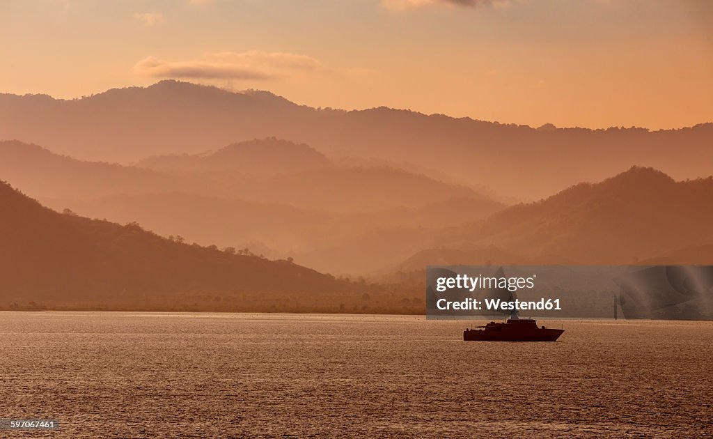 Indonesia, Sumbawa Island, Ship in the evening