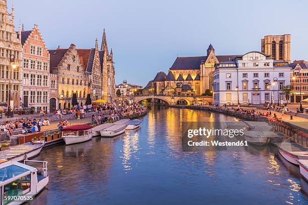 belgium, ghent, old town, korenlei and graslei, historical houses at river leie at dusk - ベルギー ストックフォトと画像