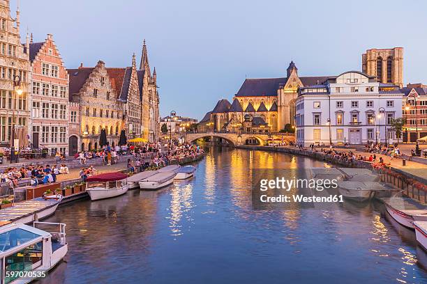 belgium, ghent, old town, korenlei and graslei, historical houses at river leie at dusk - belgium stock pictures, royalty-free photos & images