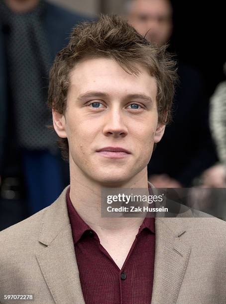 George MacKay arriving at the Burberry Prorsum show at the London Collections: Men AW15 in London.