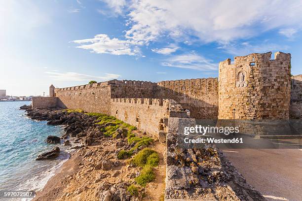 greece, rhodes, old town, city wall and paul bastion - historic district stock-fotos und bilder