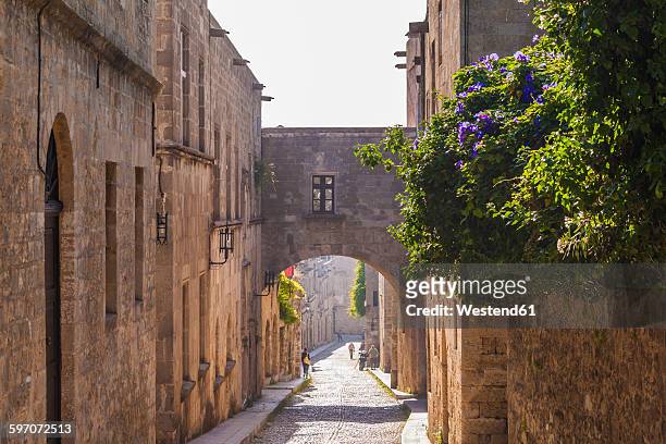 greece, rhodes, old town, medieval road odos ippoton - rhodes,_new_south_wales stock pictures, royalty-free photos & images