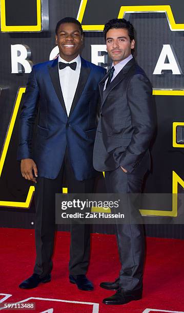 John Boyega and Oscar Isaac arriving at the European premiere of "Star Wars - The Force Awakens" in Leicester Square, London