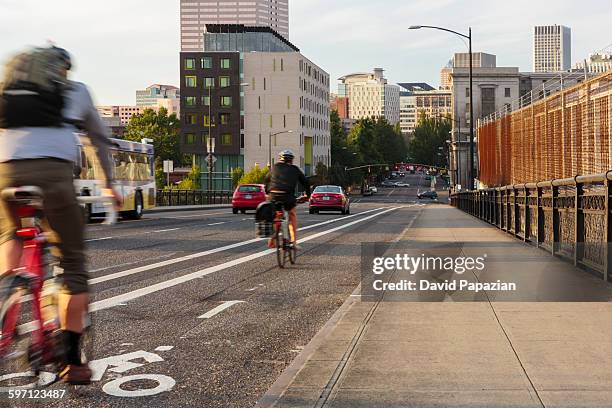 bike riders heading to city - portland - oregon bildbanksfoton och bilder