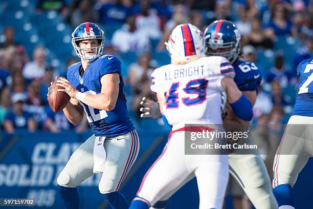 Ryan Nassib of the New York Giants drops back to pass during the game against the Buffalo Bills on August 20, 2016 at New Era Field in Orchard Park,...