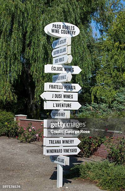 Winery directional sign is viewed near Kiler Canyon on August 13 near Paso Robles, California. Because of its close proximity to Southern California...