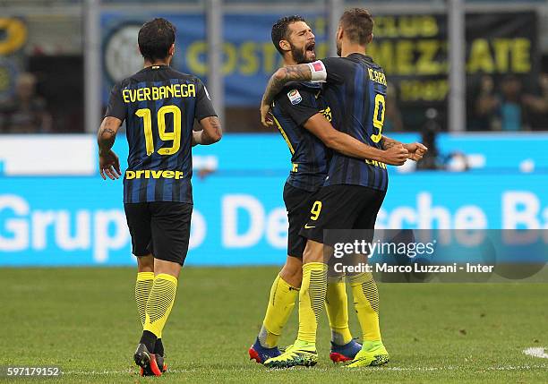 Mauro Emanuel Icardi of FC Internazionale celebrates his goal with his team-mate Antonio Candreva during the Serie A match between FC Internazionale...