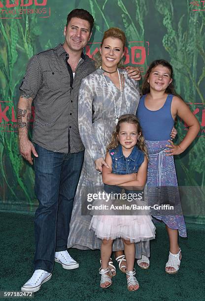 Actress Jodie Sweetin, daughters Zoie Laurel May Herpin and Beatrix Carlin Sweetin Coyle, and Justin Hodak arrive at the premiere of Focus Features'...