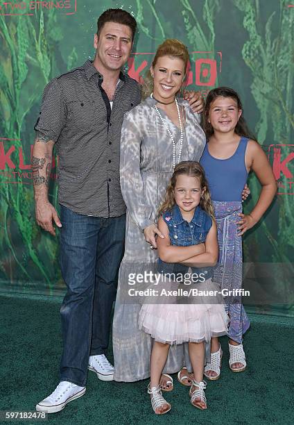Actress Jodie Sweetin, daughters Zoie Laurel May Herpin and Beatrix Carlin Sweetin Coyle, and Justin Hodak arrive at the premiere of Focus Features'...