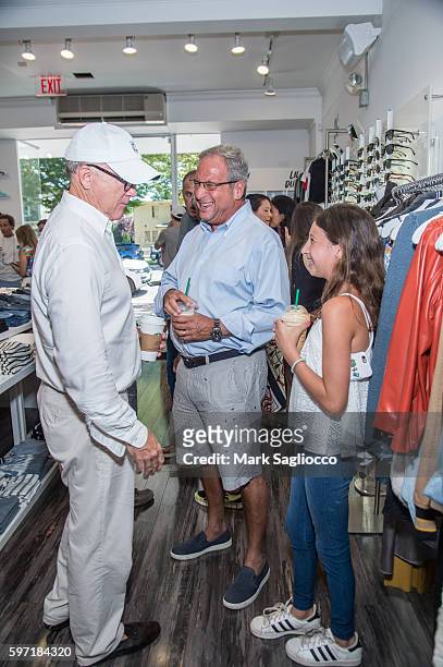 Woody Johnson, Neil Sroka and Gracie Lebersfeld attend the Breakfast and Mimosas At Blue & Creamat Blue & Cream on August 28, 2016 in East Hampton,...