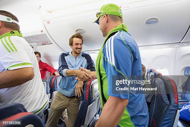 Seattle Sounders alum Roger Levesque greets fans during of Delta Fabric of Sounders FC Fan Flight to Portland on August 28, 2016 in Seattle,...