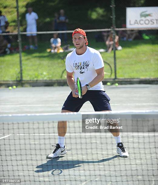Tennis Player Denis Kudla LACOSTE And City Parks Foundation Host Tennis Clinic In Central Park at Central Park Tennis Center on August 28, 2016 in...