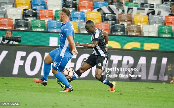 Emmanuel Agyemang Badu of Udinese Calcio competes with Federico Dimarco of Empoli FC during the Serie A match between Udinese Calcio and Empoli FC at...