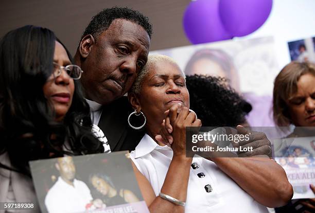 Diann Aldridge , the mother of Nykea Aldridge is counseled during a prayer vigil for her daughter outside Willie Mae Morris Empowerment Center on...