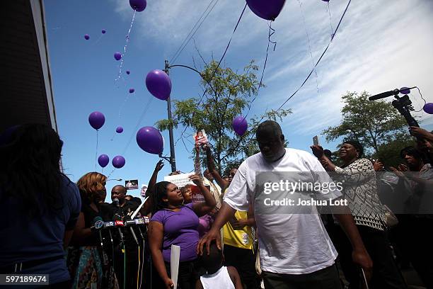 Balloons are released during a prayer vigil for Nykea Aldridge outside Willie Mae Morris Empowerment Center on August 28, 2016 in Chicago, Illinois....