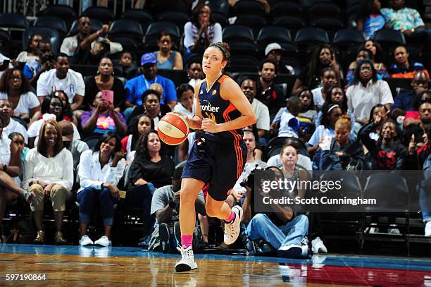 Kelly Faris of the Connecticut Sun handles the ball against the Atlanta Dream on August 28, 2016 at Philips Arena in Atlanta, Georgia. NOTE TO USER:...