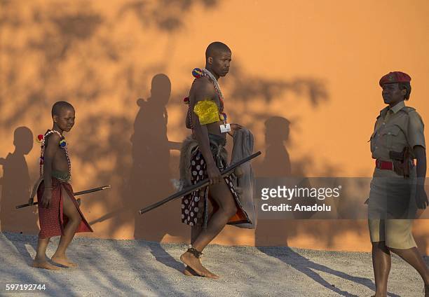 People perform shows during a traditional ceremony, Umhlanga Festival at Ludzidzini Royal Village in Lobamba, Swaziland on August 28, 2016. Umhlanga,...