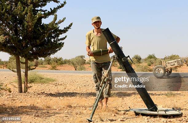 Members of the Free Syrian Army make preparations to attack PYD/PKK terrorists around Bir Al Kusa village after taking control of the village from...