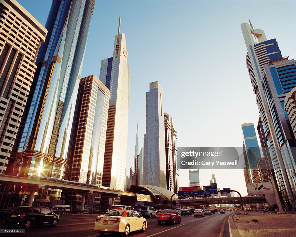 Skyscrapers along Sheikh Zayed Road at sunset