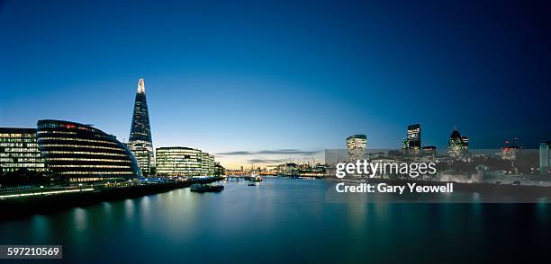 london skyline and river thames at dusk - shard london bridge stock pictures, royalty-free photos & images